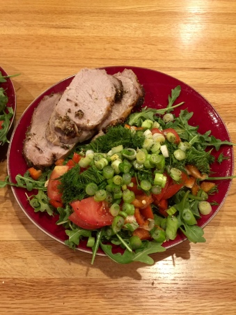 plated pork loin with salad